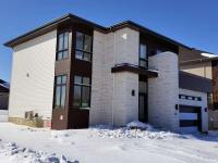 Fen&ecirc;tres en PVC et porte d'entr&eacute;e en acier